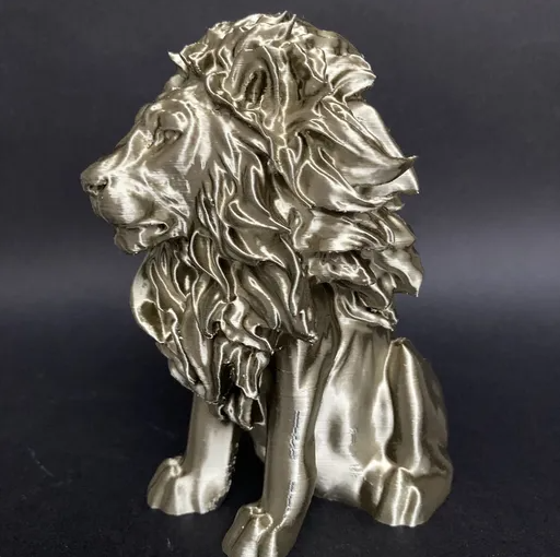 Metallic 3D printed lion statue.  