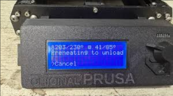 The LCD control screen of an Original Prusa 3D printer displaying the progress of the nozzle and heated bed during preheating.