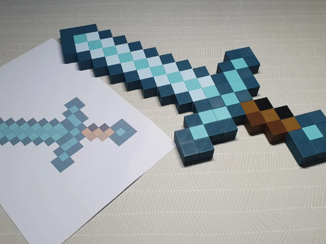 Life-size replica of the famous Minecraft Diamond Sword built using snap-together 3D printed pixel blocks