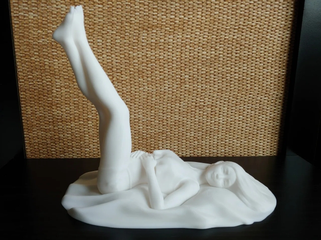 3D printed resting girl statue bookend.  