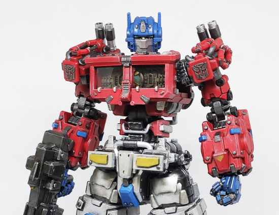 A highly detailed, professionally painted 3D printed Optimus Prime model featuring fully movable joints and battle-worn armor textures.