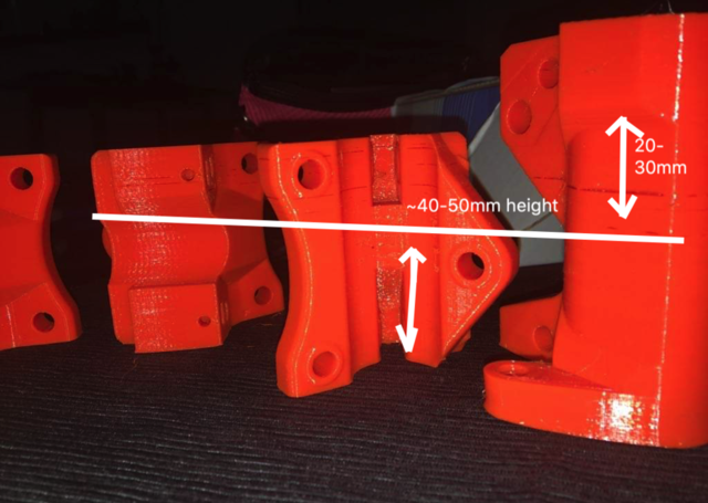 Measuring the vertical height of PETG printed parts to verify dimensional accuracy across layers.