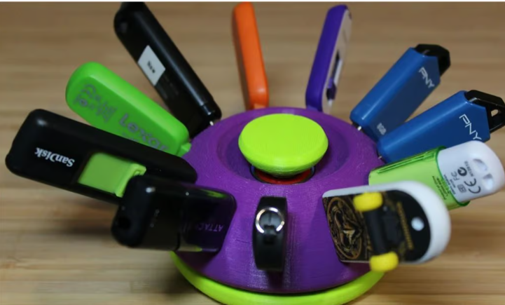 A rotating, circular 3D printed Lazy Susan USB holder in purple and green