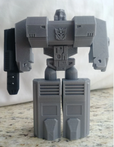 ​​​​A 3D printed model of the Decepticon Soundwave in his classic G1 blue and grey design, featuring his iconic cassette player chest.