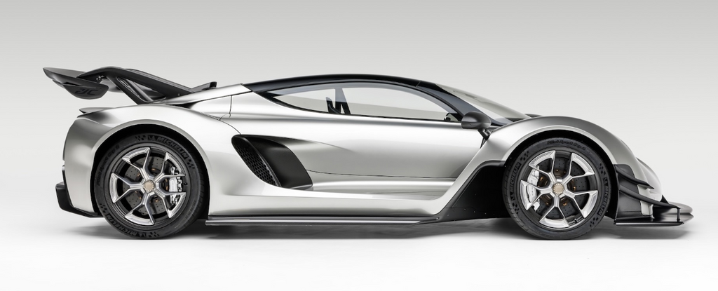A sleek, silver Czinger 21C supercar showcasing how 3D printing is used to create lightweight, high-performance automotive parts