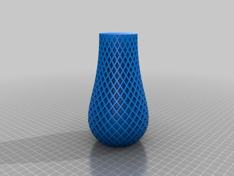 A tall, blue 3D-printed vase featuring an intricate diamond lattice pattern, displayed within a digital 3D modeling workspace