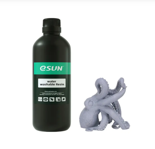 A bottle of green-labeled eSun water washable resin next to a smooth, 3D-printed grey octopus.