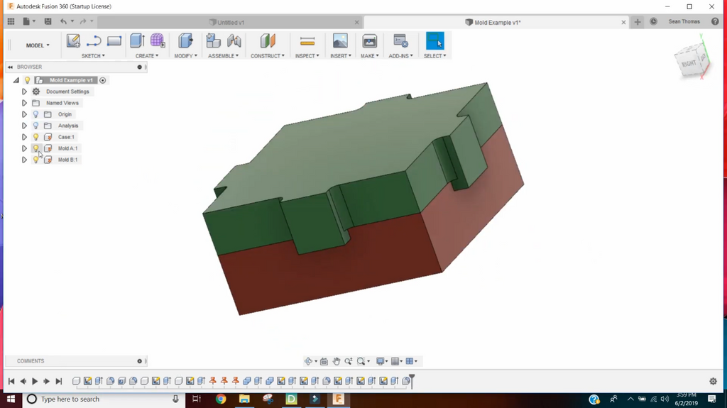A computer monitor displaying Autodesk Fusion 360 CAD software being used to design a two-part block casting mold.