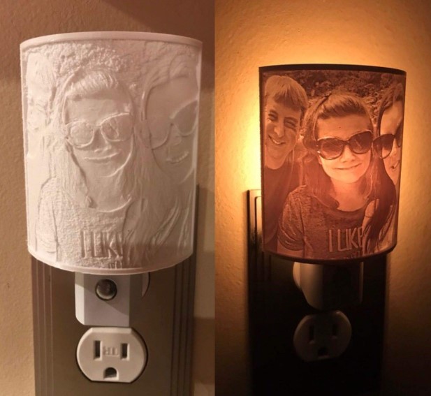 A side-by-side comparison of a 3D-printed lithophane night light, showing the textured white surface when turned off, and a detailed family portrait when backlit