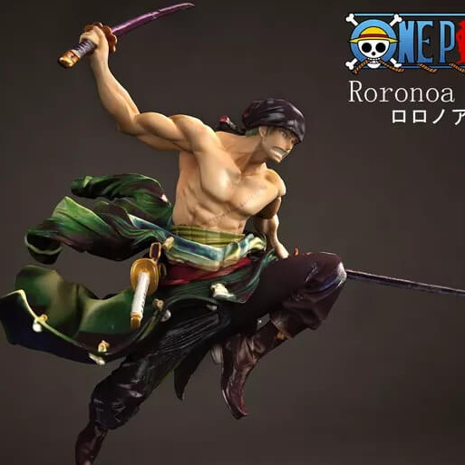 A highly detailed, painted 3D printed statue of Roronoa Zoro from One Piece mid-jump with his swords drawn and a flowing green coat.