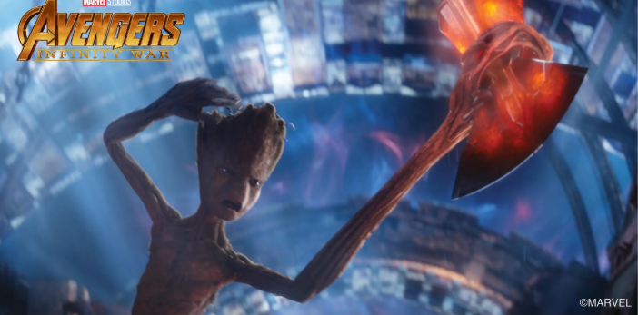 Teenage Groot from Avengers: Infinity War holding up the newly forged Stormbreaker axe