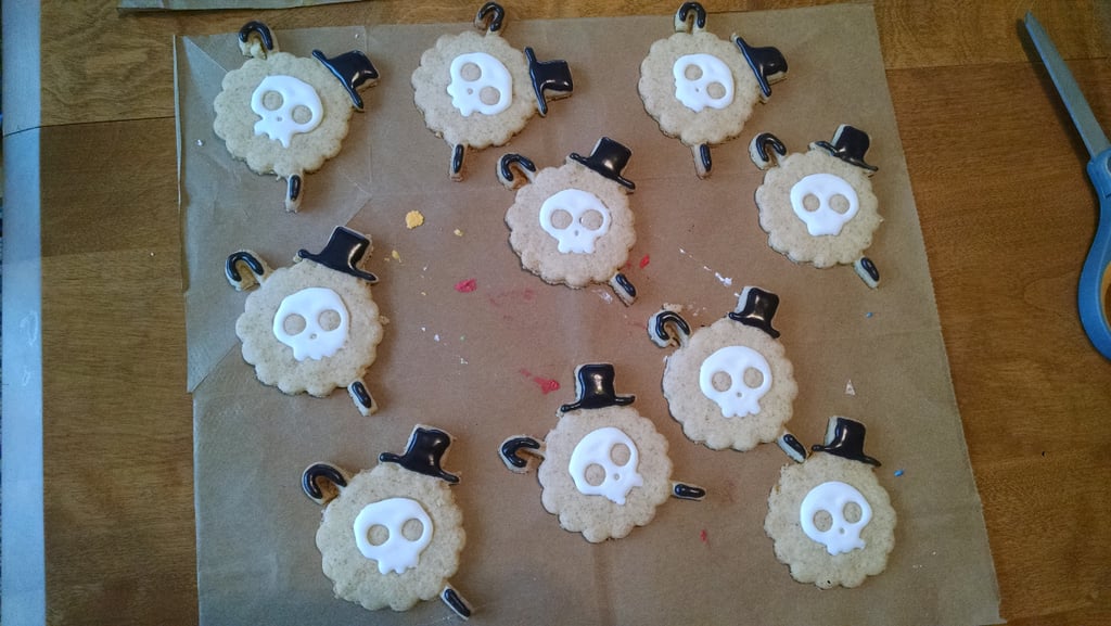 Freshly baked sugar cookies shaped like the One Piece Jolly Roger skull and crossbones, made using a custom 3D printed cookie cutter set