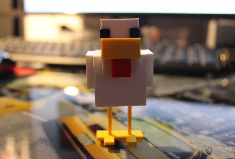 Decorative 3D printed Minecraft chicken figure showing snap-together blocky features