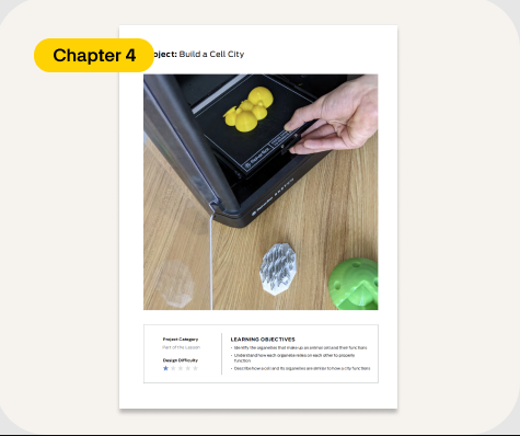 A sample lesson plan page from the MakerBot Educator's Guidebook showing a student removing a yellow 3D printed cell model from a print bed