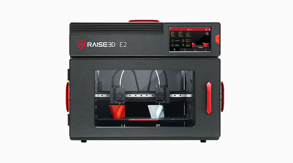 The enclosed Raise3D E2 professional dual-extrusion 3D printer designed for workshops and engineering settings.