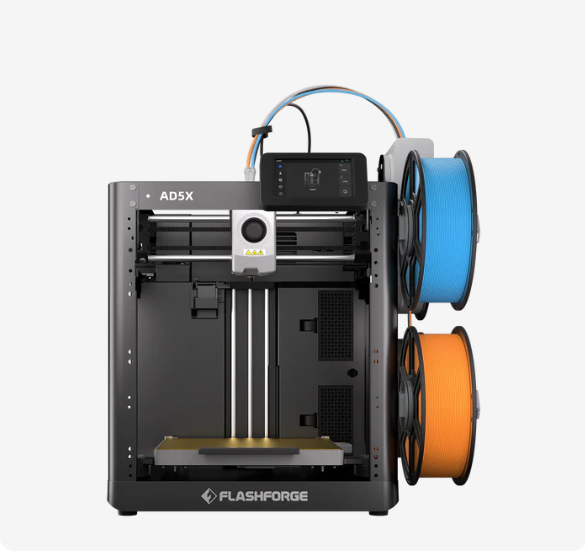 The FlashForge AD5X IDEX 3D printer displaying its two separate extruders and enclosed build area.