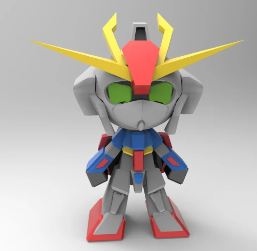 A super deformed SD Z Gundam 3D-printed figure with a large head, prominent yellow V-fin, and blue, red, and white body parts.