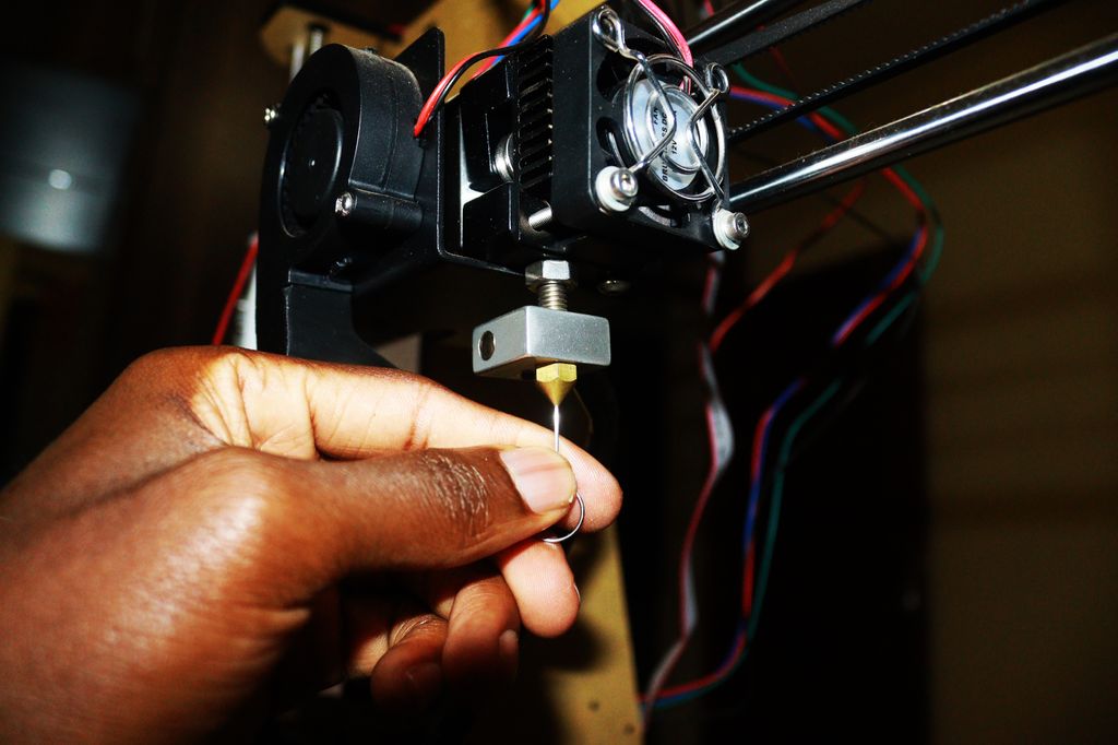 Cleaning nozzle of 3D printer