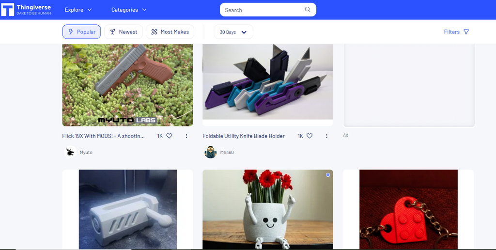 The Thingiverse website interface displaying popular downloadable 3D models.  