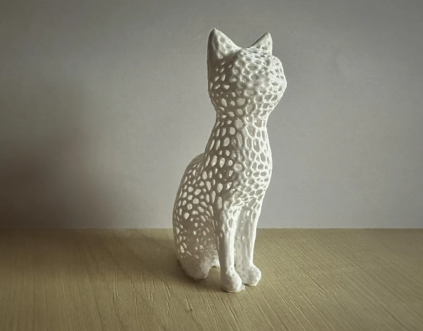White 3D printed Voronoi cat statue.  