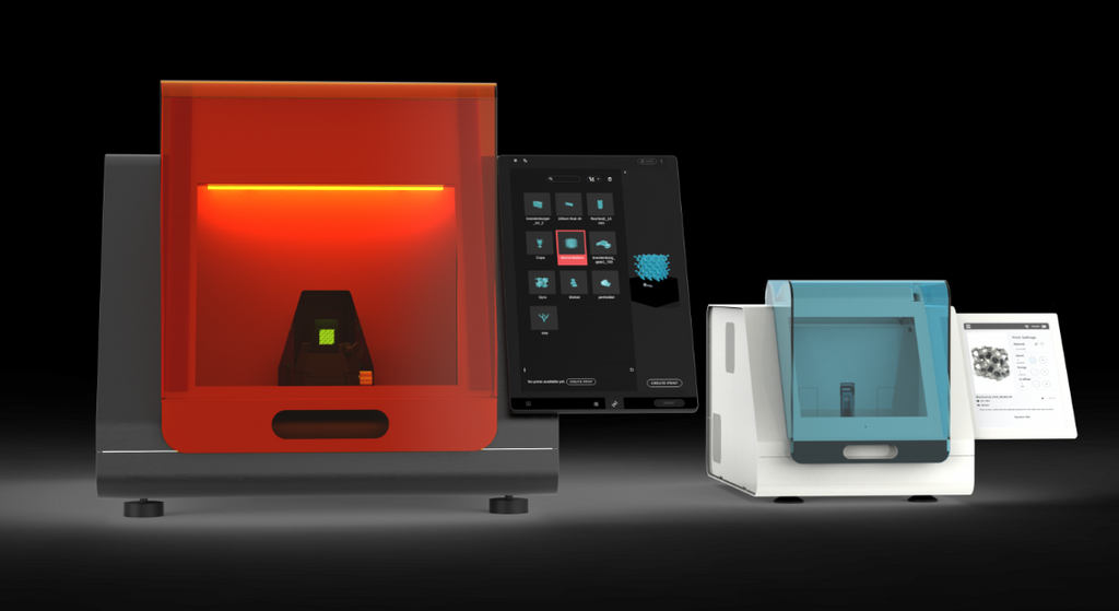 A modern, high-speed volumetric 3D printer setup featuring a red illuminated resin vat next to a secondary curing station